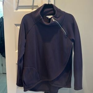Up for sale an eggplant colored asymmetrical fleece sweater.
